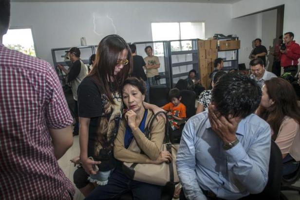 INDONESIE:Une famille de dix personnes a raté le vol fatal d'Air Asia