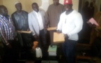 Signature de contrat entre le lutteur Eumeu Séne et le promoteur Aziz Ndiaye